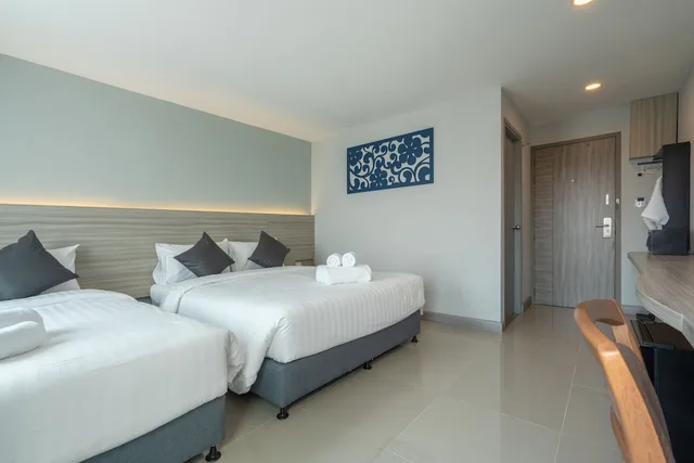 غرفة ديلوكس ثلاثية بسرير كوين وسرير فردي، Cozy Blu Suvarnabhumi 2/3