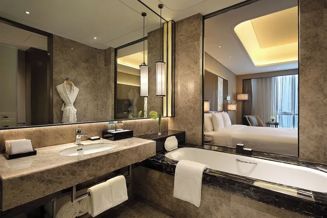 غرفة ديلوكس بسرير كينج بإطلالة على الجبل، Wanda Realm Taian 6/8