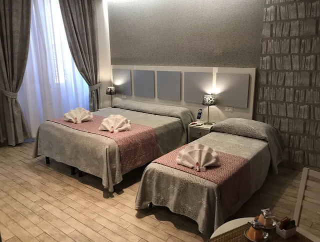 غرفة سوبيريور ثلاثية بسرير مزدوج وسرير فردي بجاكوزي، Five Rooms Rome 1/10