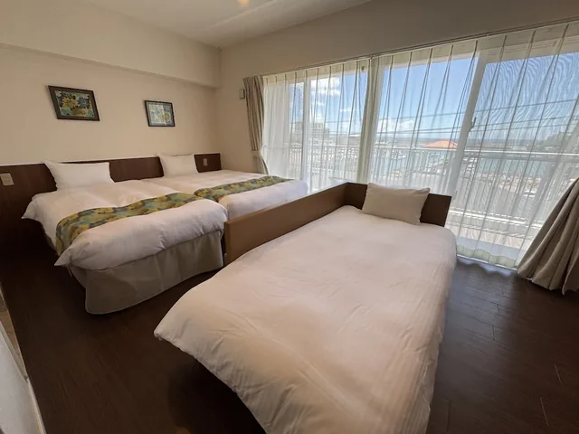 غرفة سوبيريور بسرير مزدوج وسرير فردي بإطلالة على المرفأ مع أريكة، Seaside Condominium Rana Chatan 4/10