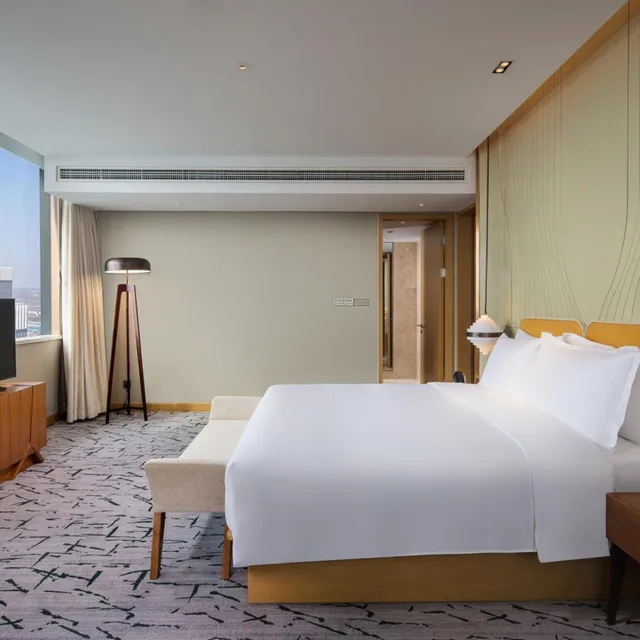 جناح بسرير كينج بغرفة نوم واحدة مع دخول الصالة، Holiday Inn Tianjin Xiqing 3/8