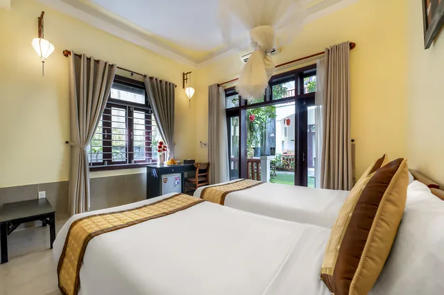 غرفة سوبيريور بسرير كينج بإطلالة على الحديقة بشرفة، Loc Phat Hoi An Homestay - Villa 1/10