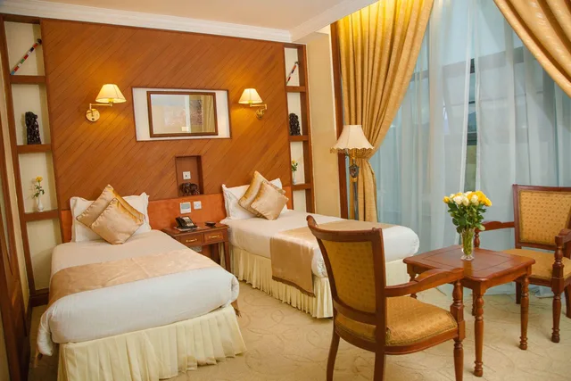 غرفة ديلوكس بسرير كوين، Palace Hotel Arusha 2/3