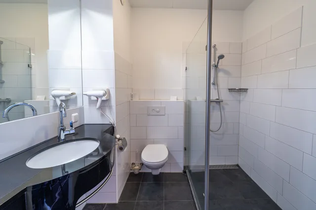 غرفة عائلية بسريرين منفصلين وسرير بطابقين، Hotel de Bonte Wever Assen 5/6