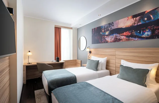 غرفة كومفورت بسريرين منفصلين، Leonardo Boutique Hotel Linz City Center 1/5