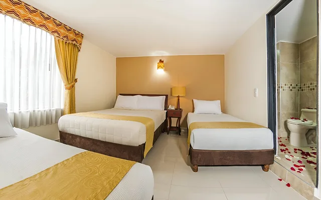 غرفة أساسية رباعية بسرير مزدوج وسرير فردي بغرفة نوم واحدة، Hotel Ayenda Gran Marquez 1014 1/1