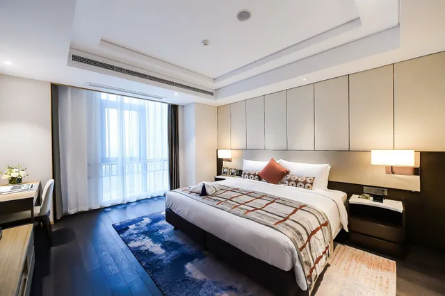 غرفة ديلوكس بسرير كينج بغرفة نوم واحدة، Somerset Harmony City Wuxi 1/7