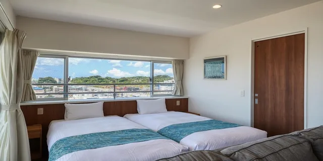 غرفة سوبيريور بسرير مزدوج وسرير فردي بإطلالة على المرفأ مع أريكة، Seaside Condominium Rana Chatan 3/10