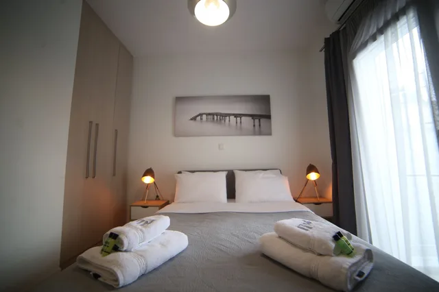 شقة بأربعة أسرّة وسريرين مزدوجين بـ3 غرف نوم مع أريكة، Athens Morum Apartments Formionos 1/2