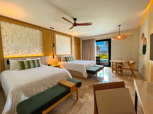 Serenity Club Junior Suite Swin Out Partial Ocean View 2 Queen Beds، Haven Riviera Cancun Resort & Spa All Inclusive - Adults Only 1/2