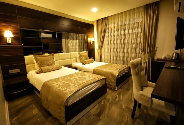 جناح عائلي بسريرين منفصلين، Venus Suite Hotel 1/2
