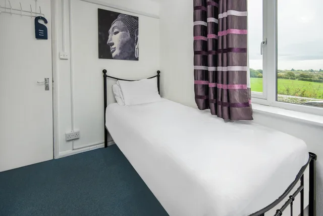 غرفة قياسية بسريرين منفصلين، OYO Chriss Motel 7/10
