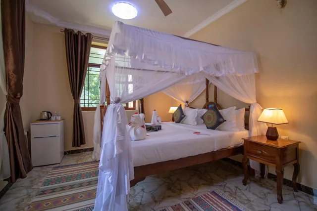 غرفة سوبيريور بسرير كينج، Sunny Palms Beach Bungalows 3/10