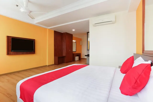 غرفة بريميوم بسرير كينج، Collection O Hotel Super Cowboy 3/5