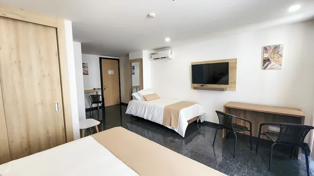 غرفة قياسية ثلاثية بسرير كينج مع أريكة، Hotel BE Suites Cali 7/10