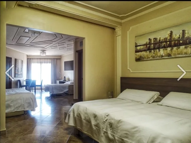 غرفة عائلية بإطلالة جزئية على البحر، Panoramic Hotel Taormina 1/1