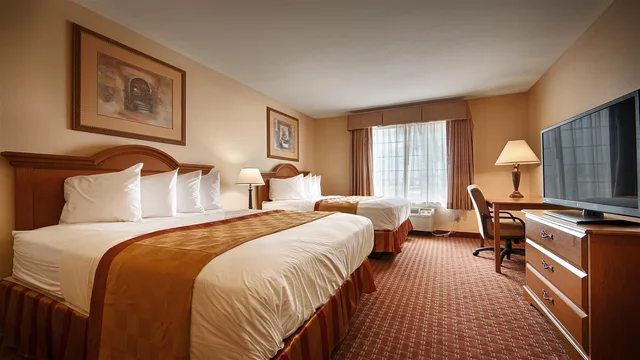 جناح بسريرين كوين بحوض استحمام لذوي الإعاقة، Best Western Casa Villa Suites 1/2