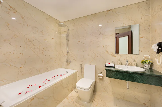 غرفة ديلوكس ثلاثية، Eden Ocean View Hotel Da Nang 3/3