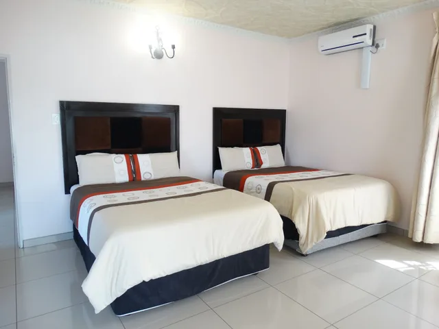 غرفة بسريرين مزدوجين، Global Village Guesthouse 2/5