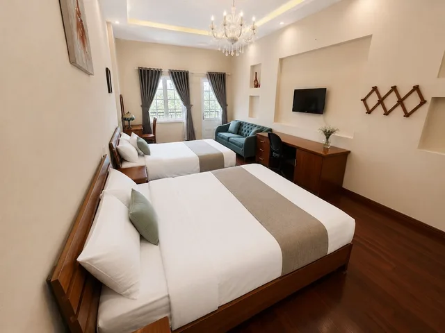جناح عائلي بسرير كينج وسرير فردي مع أريكة، Terrasse Des Roses 5/10