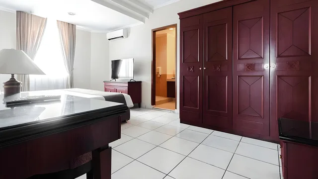 جناح ديلوكس بسرير كينج وثلاثة أسرّة بـ3 غرف نوم، Travellers Suites Serviced Apartments 5/5