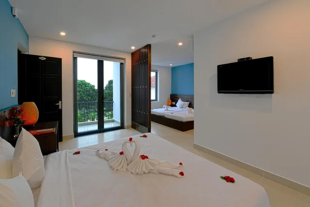 غرفة عائلية بسرير مزدوج وسريرين منفصلين، Hoi An Dream City Hotel 2/2