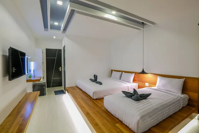 غرفة قياسية ثلاثية بسرير كينج وسرير فردي، Chaantalay Hotel 1/3