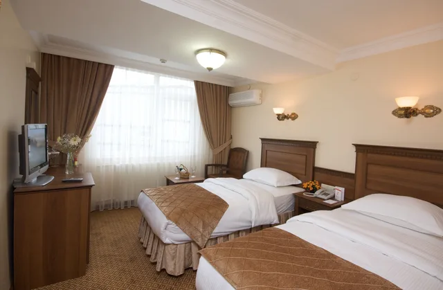 غرفة قياسية مفردة، Grand Unal 4/5