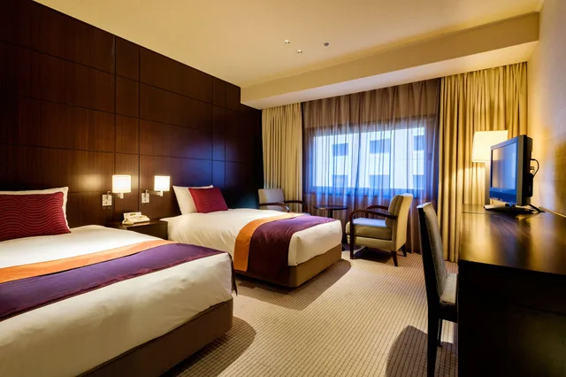 غرفة قياسية بسريرين منفصلين، Hotel Metropolitan Edmont 1/3