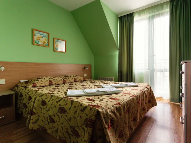 شقة كبيرة بسريرين مزدوجين بغرفتي نوم، Bright House Hotel 1/3