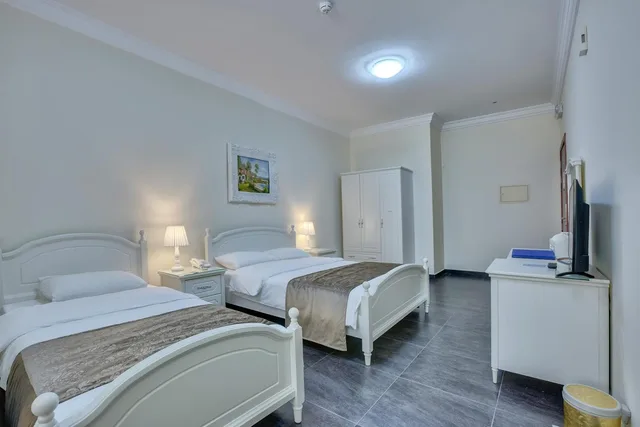 غرفة قياسية ثلاثية، Royal Hotel Sharjah 1/4