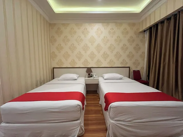 غرفة قياسية بسريرين منفصلين، Grand Tamaro Hotel Parapat 2/6