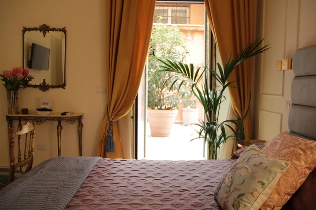 غرفة ديلوكس بسرير كوين بشرفة، Ingrami Suites 3/8