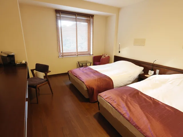 غرفة بسريرين منفصلين، Jozankei Tsuruga Resort Spa MORI no UTA 1/2