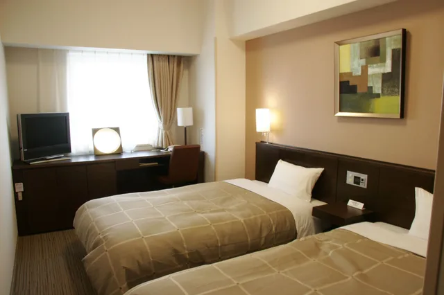 غرفة بسريرين منفصلين، Hotel Route Inn Chitose Ekimae 3/5