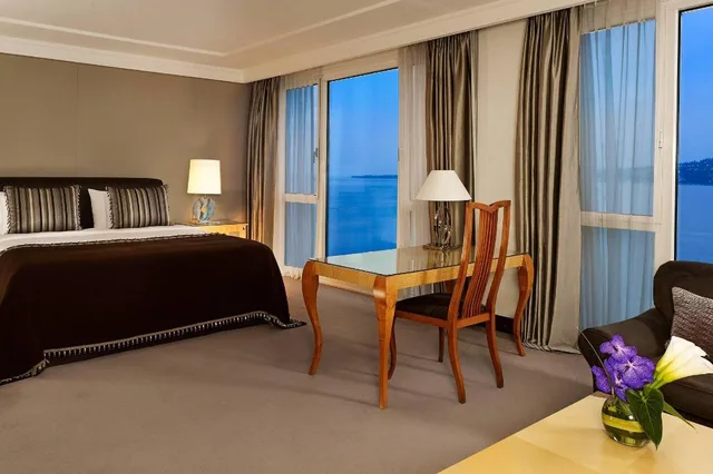 جناح رئاسي كبير بسرير كينج بإطلالة على البحيرة بغرفة نوم واحدة في طابق مرتفع، Hotel President Wilson, A Luxury Collection Hotel, Geneva 1/3