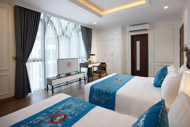 غرفة عائلية بسرير كوين وسرير فردي بإطلالة على المدينة، Grand Dragon Hotel Hanoi 3/4