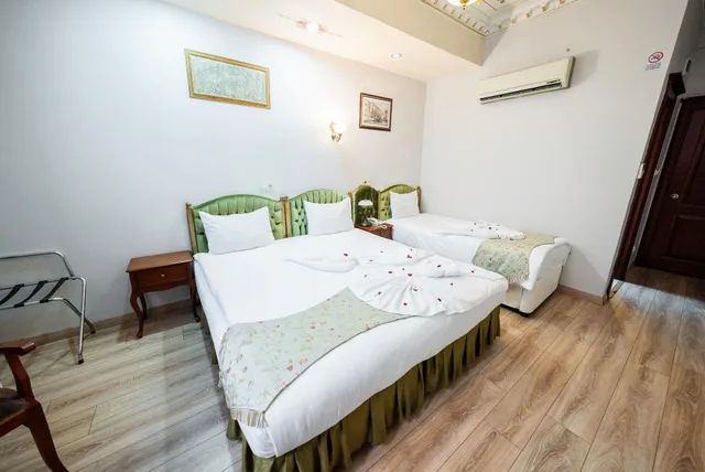 غرفة اقتصادية ثلاثية بأربعة أسرّة، Basileus Hotel 1/1