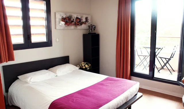 استوديو بسرير كوين بشرفة، Apart'hotel Sainte-Marthe 1/4