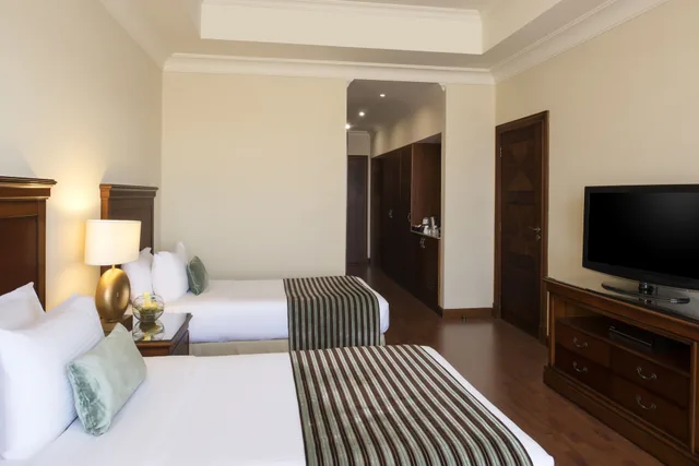 غرفة ديلوكس بسرير كينج، Concorde Hotel Doha 3/7