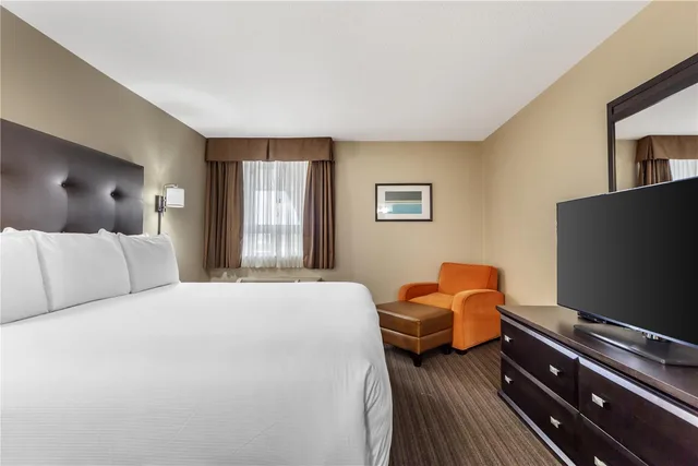 Suite, King Bed, Sofa, Exterior Entrance, Best Western Cold Lake Inn 1/2