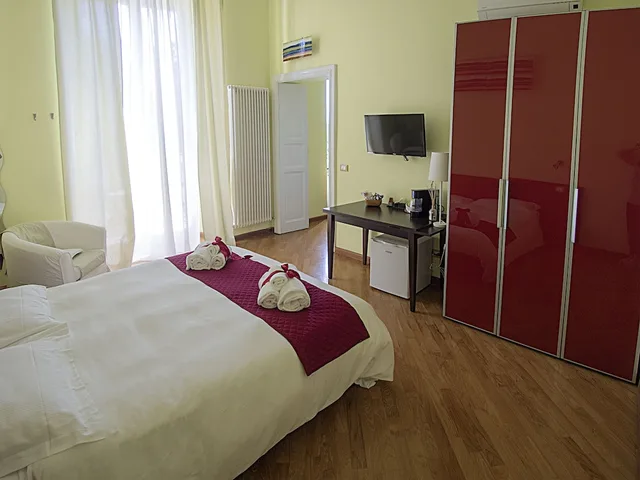 غرفة سوبيريور بسرير كينج بإطلالة على الحديقة مع أريكة، Residenza Viani Guesthouse 1/4