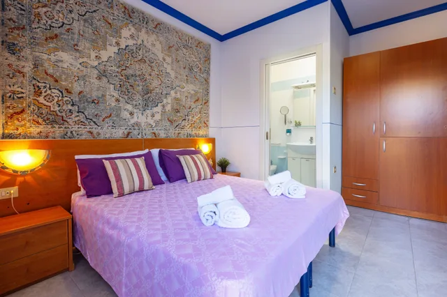 غرفة رباعية بسرير مزدوج وسرير بطابقين، Villa Vacanze Paradiso 3/5