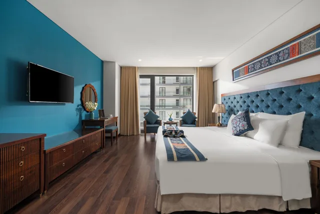 غرفة ديلوكس بسرير مزدوج بشرفة بإطلالة جزئية على البحر، Balcona Hotel Da Nang 5/6