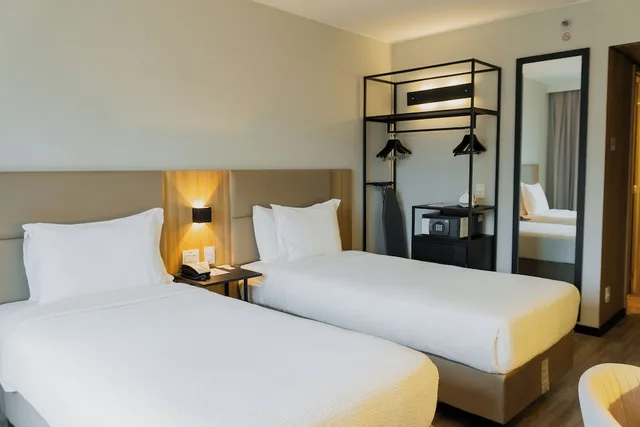 غرفة بزنس بسريرين منفصلين، Radisson Hotel Barra Rio de Janeiro 1/2