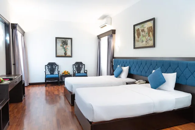 غرفة بريميوم ديلوكس بسريرين منفصلين، Royal Hotel Saigon 3/5