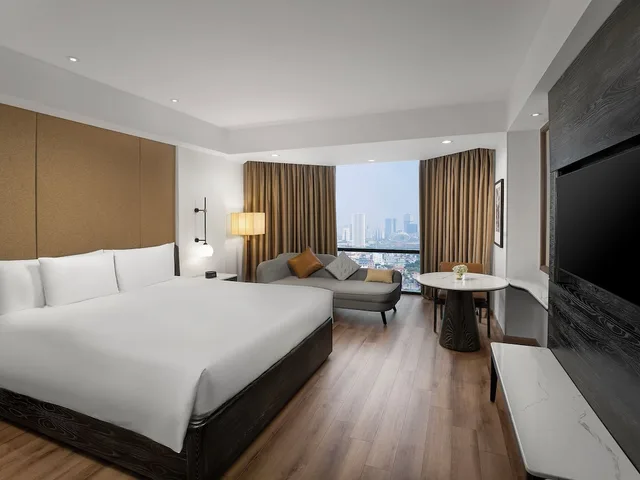 غرفة ديلوكس بسرير كينج بإطلالة على المدينة، Sheraton Hanoi West 2/8
