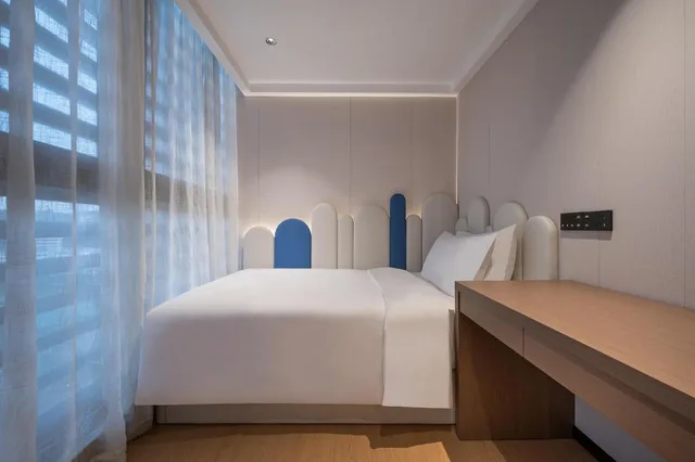 جناح ديلوكس بسرير مزدوج وسرير فردي، Novotel Hangzhou Xintiandi 6/8
