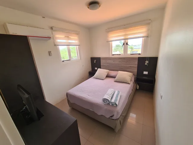 شقة ديلوكس بسرير كوين وسريرين مزدوجين، Bubali Villa And Apartments 5/10