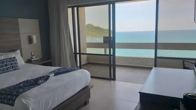 غرفة قياسية بسريرين مزدوجين بإطلالة على البحر، Ocean View Beach Hotel 2/3